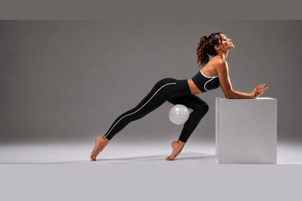 Zenzoo Activewear — lunge pose with pilates ball